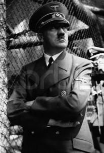 Yup, here it is, Hitler at a zoo standing in front of an animal\'s cage.  Which animal?  I don\'t know.  But there you go, just for the three of you who searched for it.